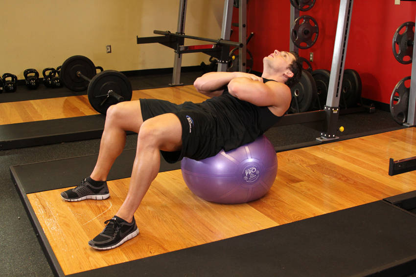 Exercise Ball Crunch — end position, working the abs