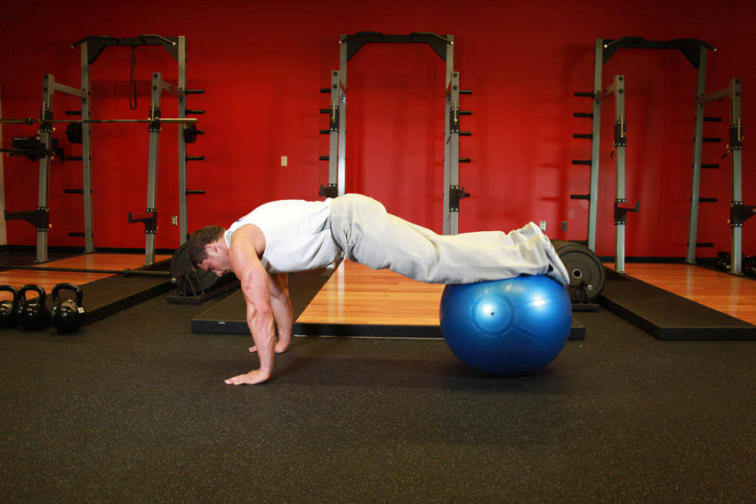 Exercise Ball Pull-In — starting position, working the abs