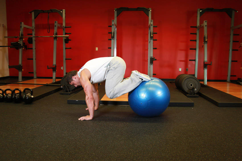 Exercise Ball Pull-In — end position, working the abs