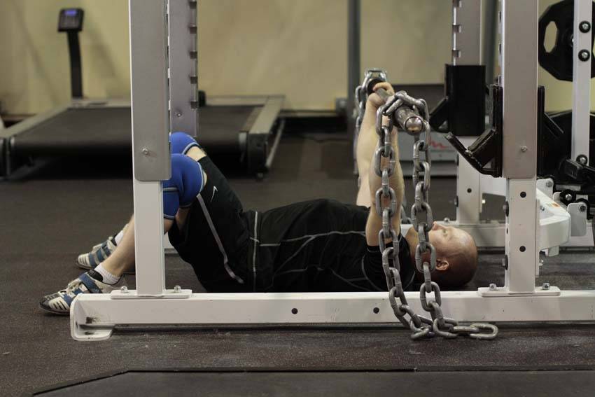 Floor Press with Chains — starting position, working the triceps
