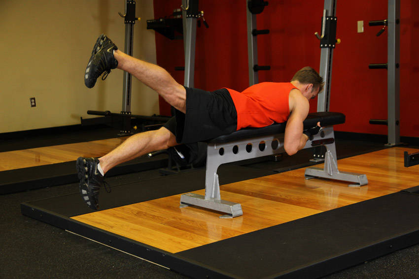 Flutter Kicks — end position, working the glutes