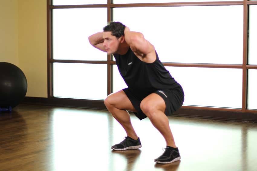 Frog Hops — end position, working the quads