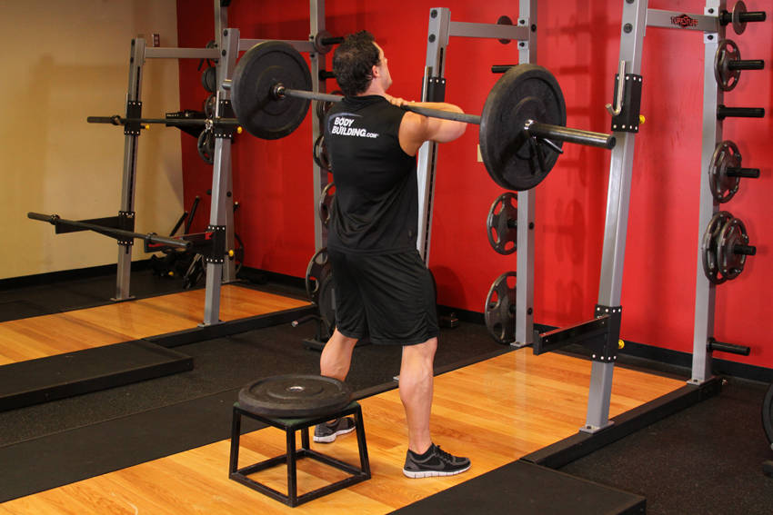 Front Barbell Squat To A Bench — starting position, working the quads