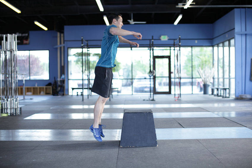 Front Box Jump — end position, working the hamstrings