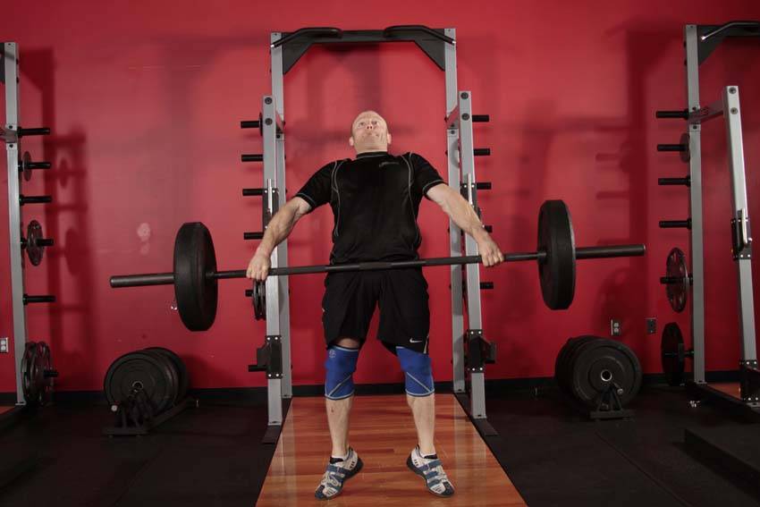 Hang Snatch — end position, working the hamstrings
