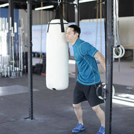 Heavy Bag Thrust — starting position, working the chest
