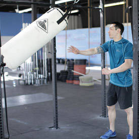 Heavy Bag Thrust — end position, working the chest