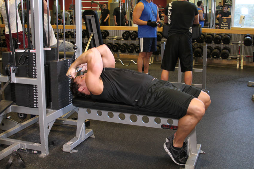 High Cable Curls — end position, working the biceps