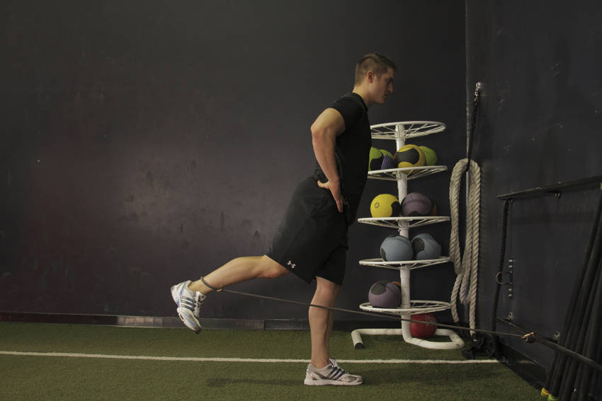 Hip Extension with Bands — end position, working the glutes