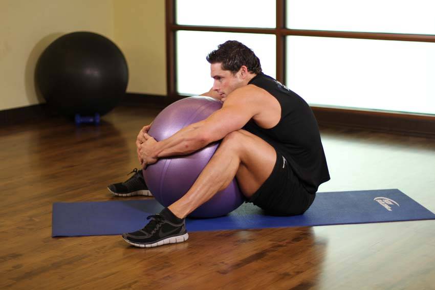 Hug A Ball — starting position, working the lower back
