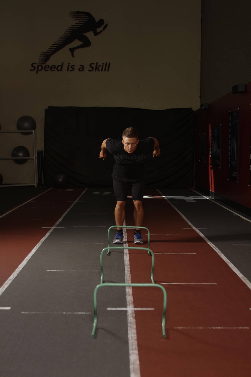 Hurdle Hops — starting position, working the hamstrings