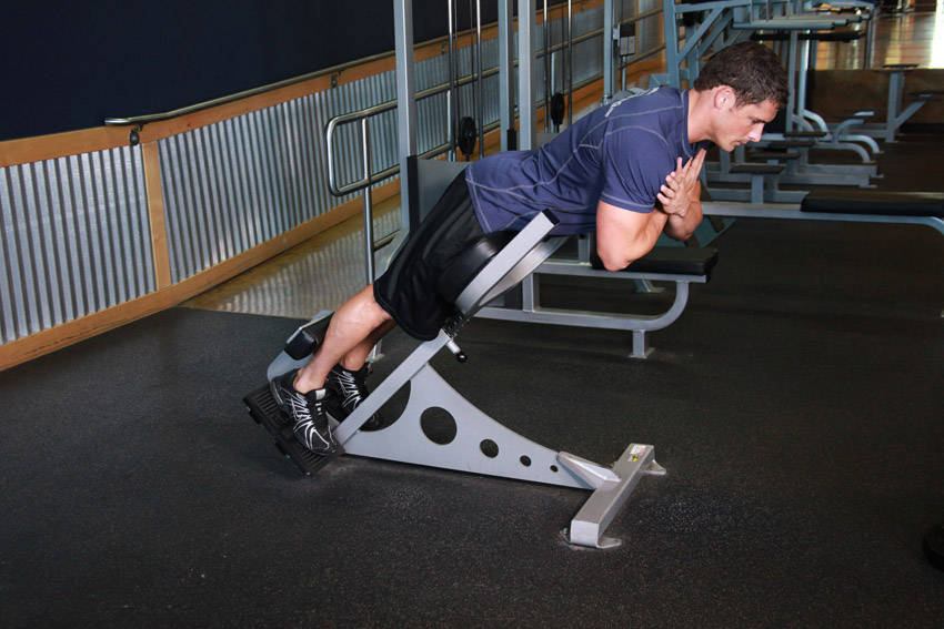 Hyperextensions (Back Extensions) — starting position, working the lower back