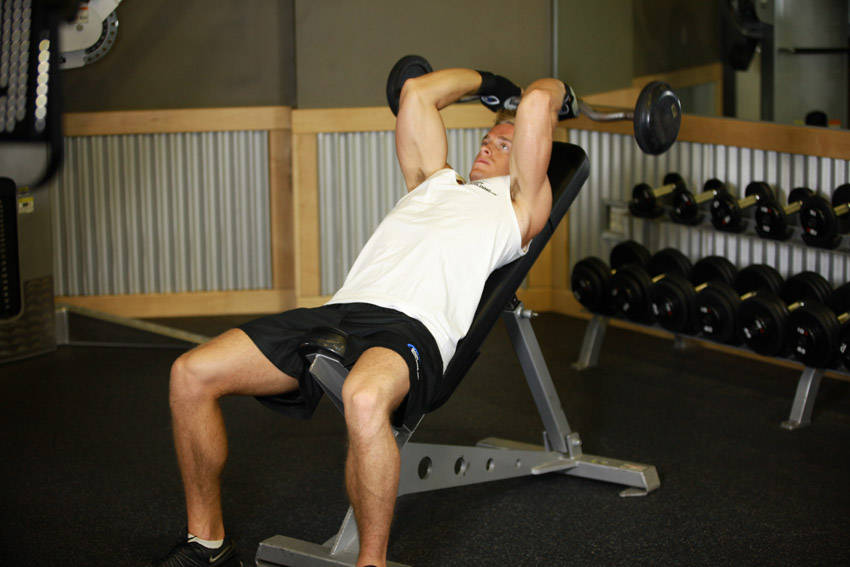Incline Barbell Triceps Extension — starting position, working the triceps
