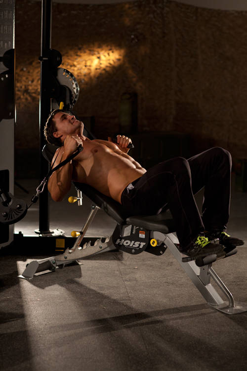 Incline Cable Chest Press — starting position, working the chest