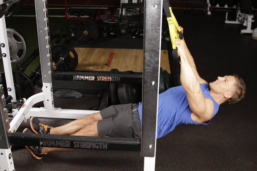 Inverted Row with Straps — starting position, working the middle back