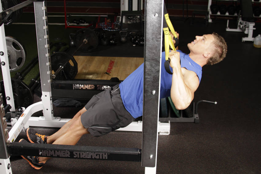 Inverted Row with Straps — end position, working the middle back