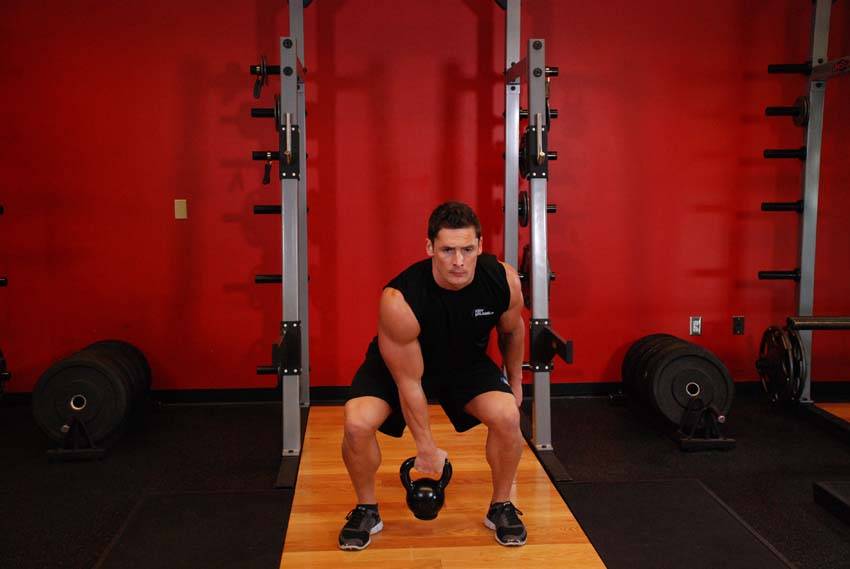 Kettlebell Hang Clean — end position, working the hamstrings