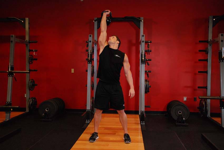 Kettlebell Windmill — starting position, working the abs