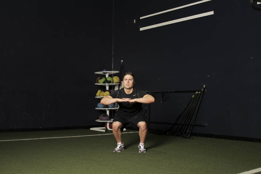 Knee Tuck Jump — starting position, working the hamstrings