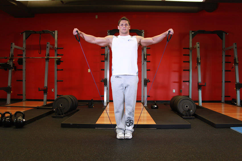 Lateral Raise - With Bands — end position, working the shoulders