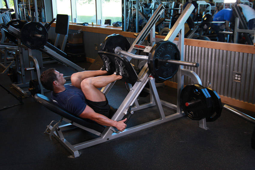 Leg Press — end position, working the quads