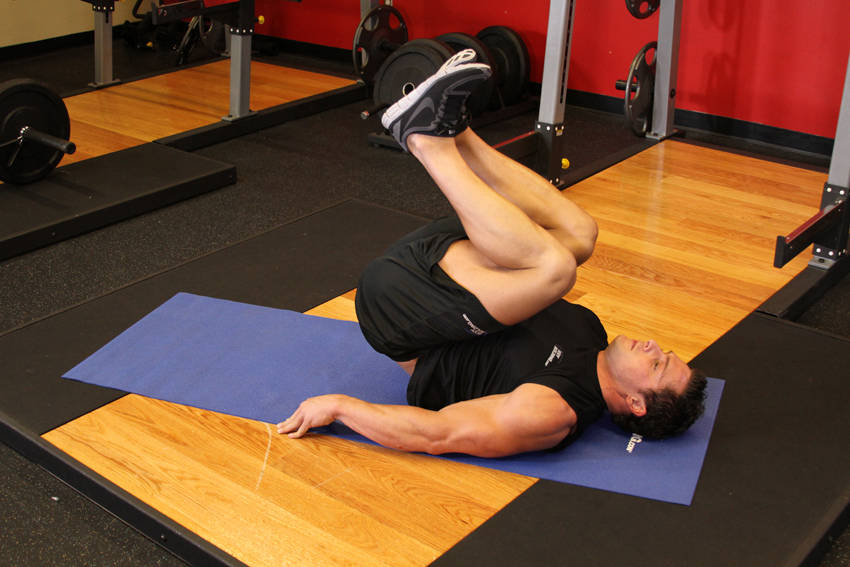 Leg Pull-In — end position, working the abs