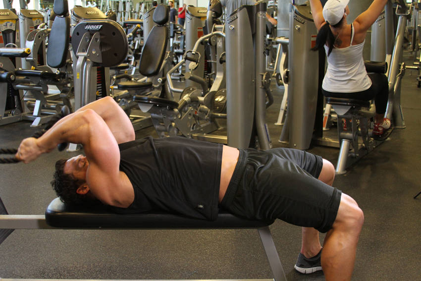 Low Cable Triceps Extension — starting position, working the triceps