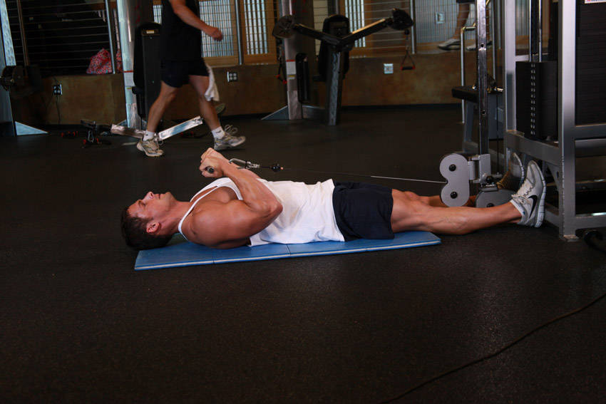 Lying Cable Curl — end position, working the biceps