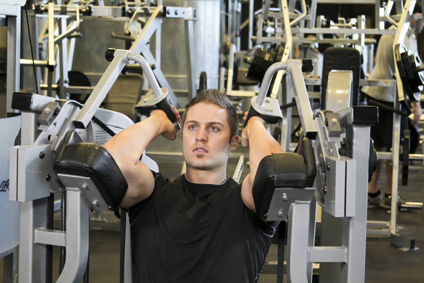 Machine Triceps Extension — starting position, working the triceps