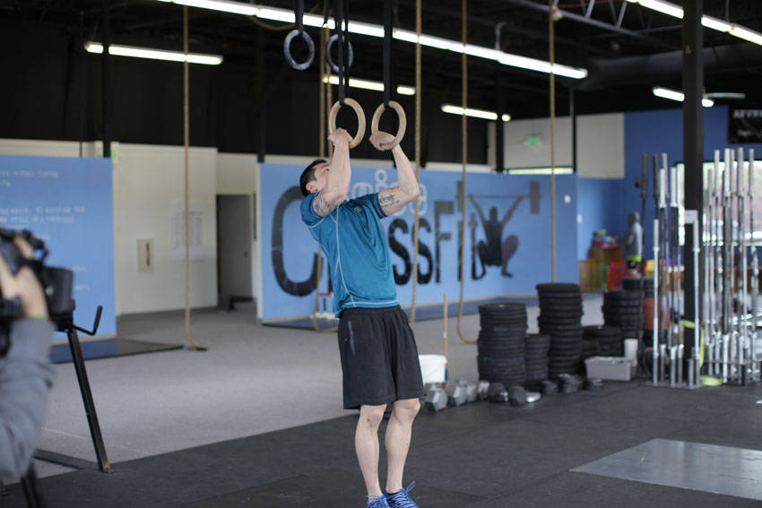 Muscle Up — starting position, working the lats