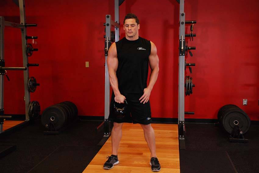 One-Arm Kettlebell Clean — starting position, working the hamstrings