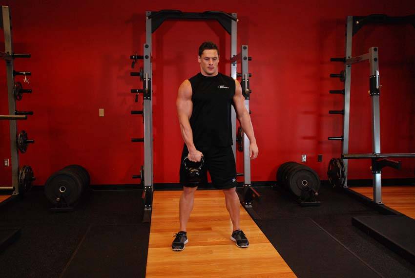 One-Arm Kettlebell Snatch — starting position, working the shoulders