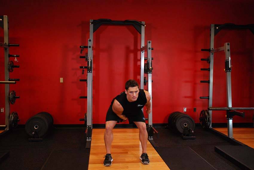One-Arm Kettlebell Snatch — end position, working the shoulders