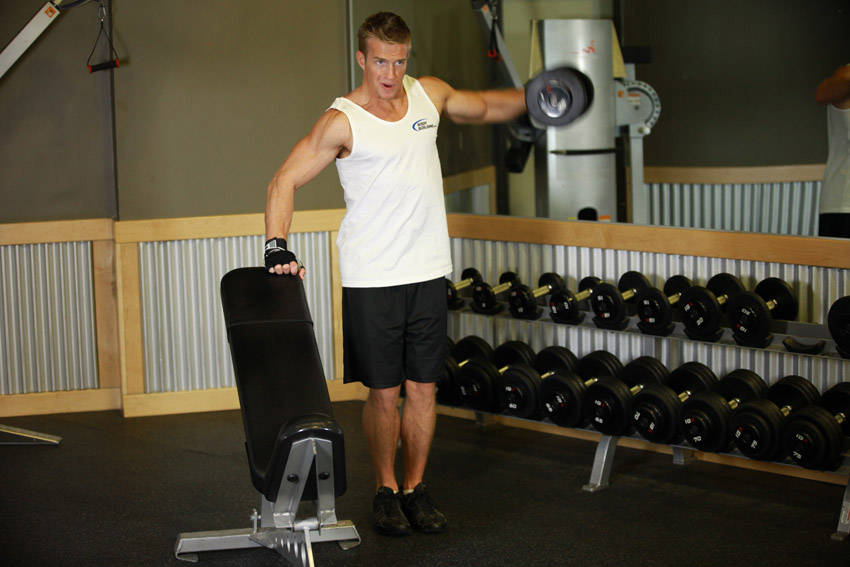 One-Arm Side Laterals — end position, working the shoulders