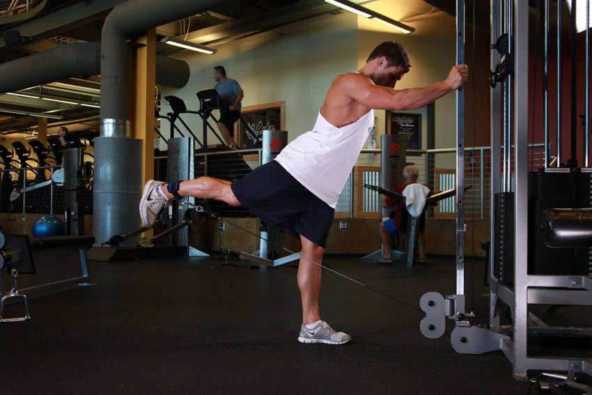 One-Legged Cable Kickback — end position, working the glutes