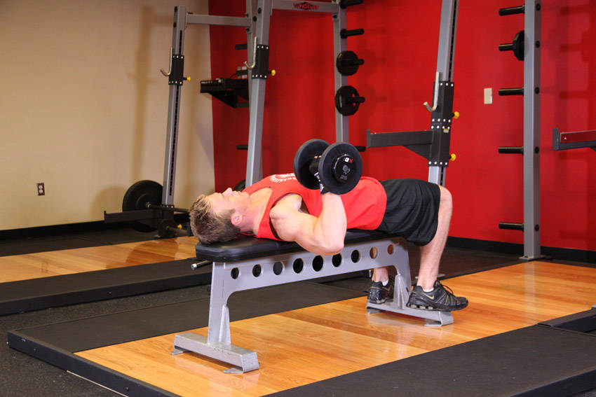 One Arm Dumbbell Bench Press — starting position, working the chest