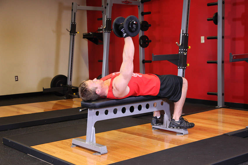 One Arm Dumbbell Bench Press — end position, working the chest