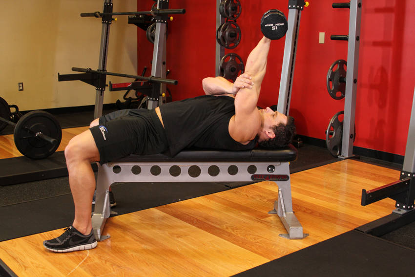 One Arm Pronated Dumbbell Triceps Extension — starting position, working the triceps