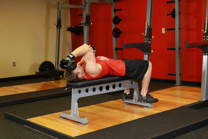 One Arm Supinated Dumbbell Triceps Extension — starting position, working the triceps