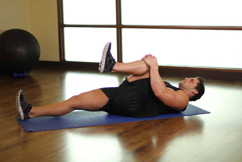 One Knee To Chest — end position, working the glutes