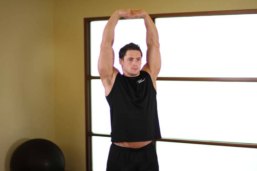 Overhead Stretch — end position, working the abs