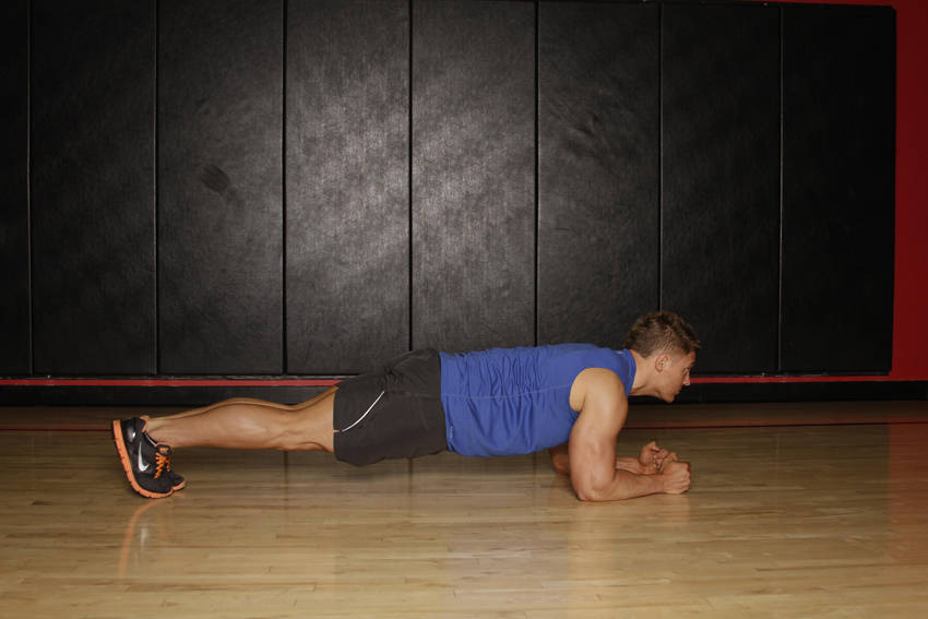 Plank — end position, working the abs