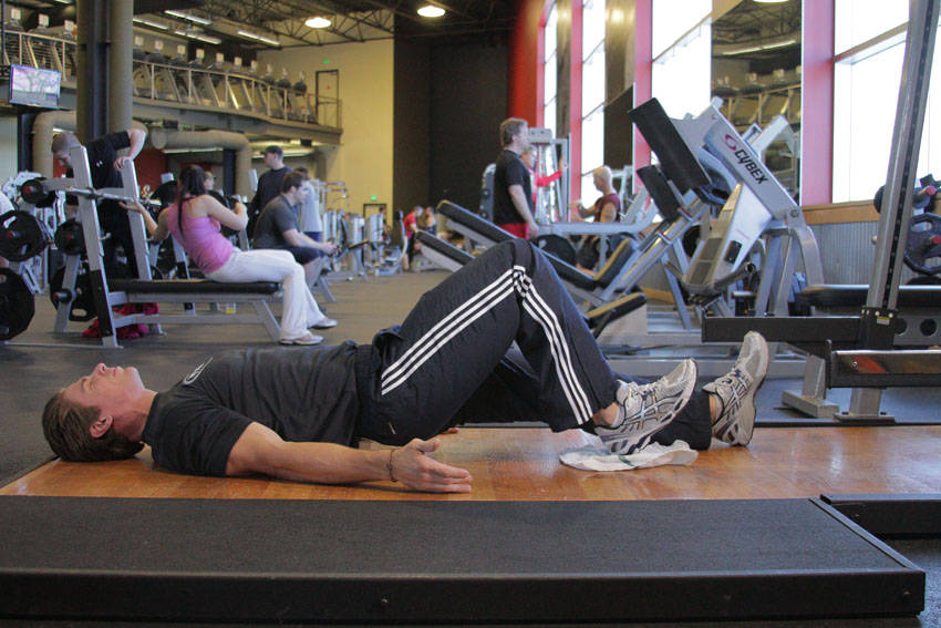 Platform Hamstring Slides — end position, working the hamstrings