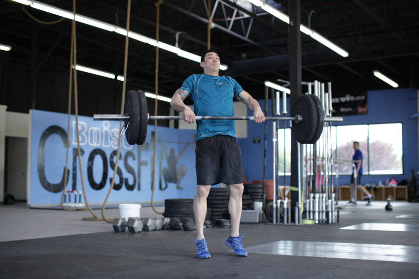 Power Clean — end position, working the hamstrings