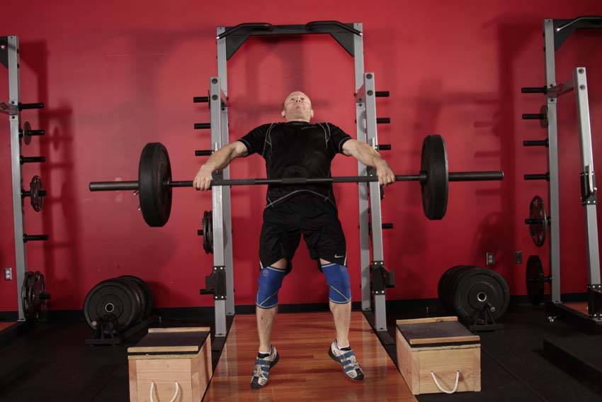 Power Snatch from Blocks — end position, working the quads