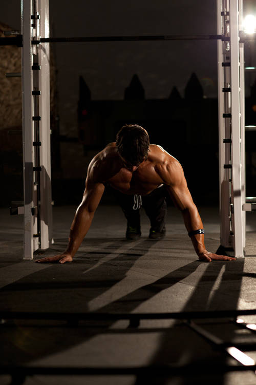 Push-Up Wide — starting position, working the chest