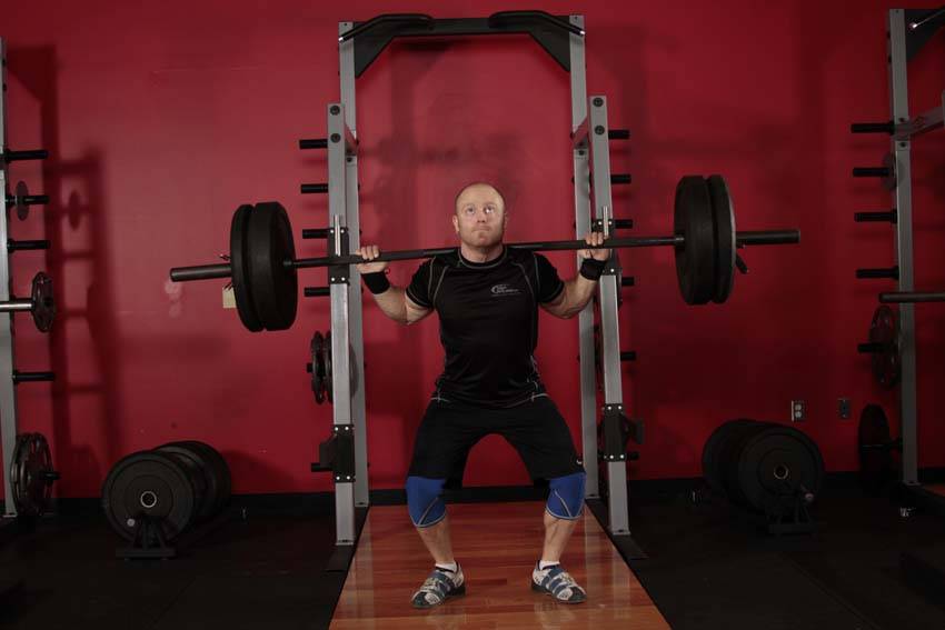 Push Press - Behind the Neck — end position, working the shoulders