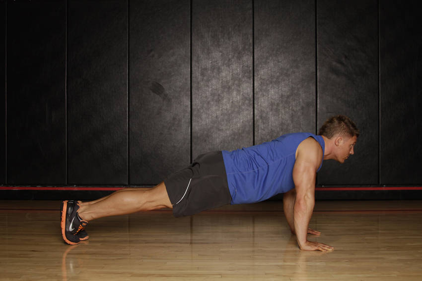 Push Up to Side Plank — starting position, working the chest