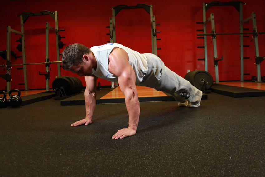 Pushups — starting position, working the chest