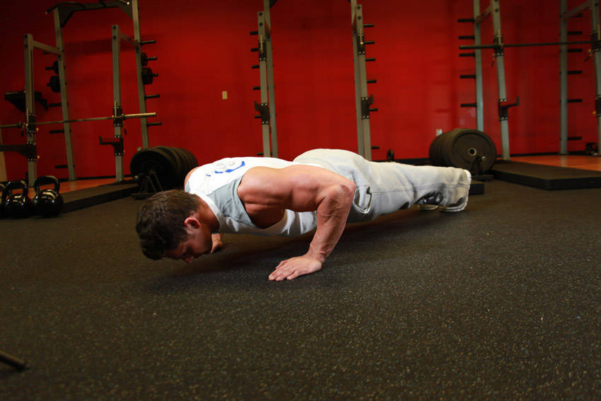 Pushups — end position, working the chest